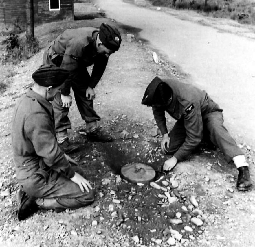Booby trapping a mine